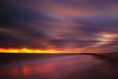 Scenic view of dramatic sky over sea