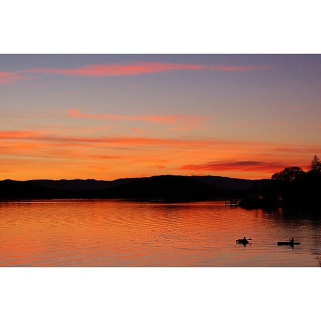 sunset, water, transfer print, scenics, lake, tranquil scene, sky, tranquility, silhouette, mountain, beauty in nature, auto post production filter, reflection, waterfront, orange color, nature, idyllic, mountain range, dusk, cloud - sky