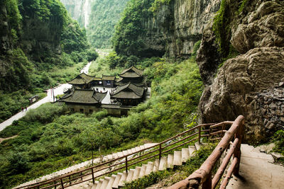 High angle view of built structure amidst plants and trees
