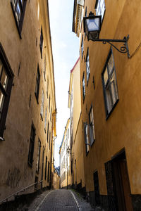 Narrow alley amidst buildings