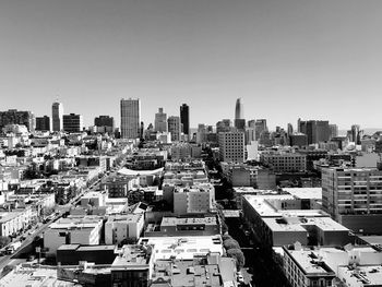 High angle view of modern buildings against clear sky