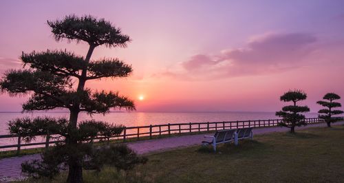 Scenic view of sea against sky at sunset