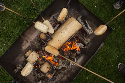 High angle view of food in barbecue grill