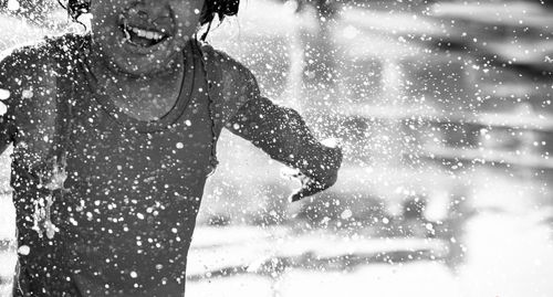 Blurred motion of woman running on water