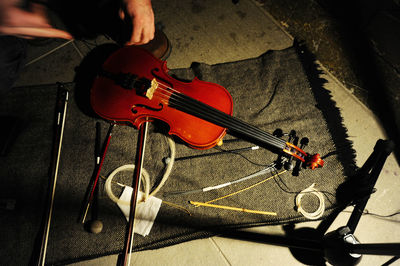 High angle view of man playing guitar