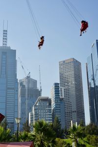 Low angle view of modern buildings against clear sky