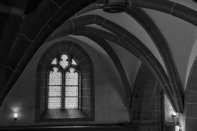 Low angle view of glass window of building