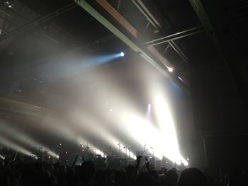 Rear view of people enjoying music concert