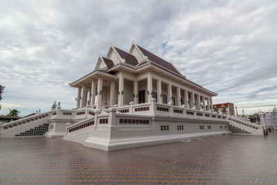 Building against cloudy sky