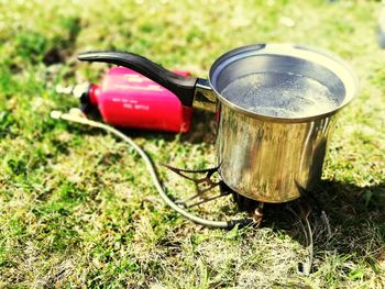 Close-up of coin-operated binoculars on field
