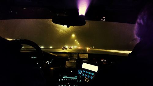 Car on road at night