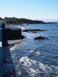 Scenic view of sea against blue sky