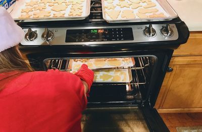 High angle view of woman preparing food at home