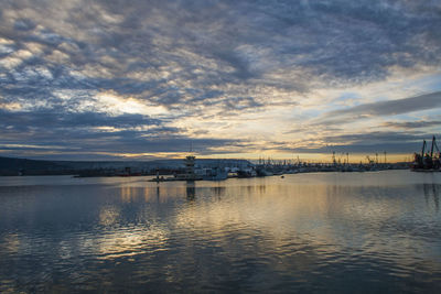 Scenic view of sea against sky at sunset