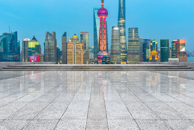 Modern buildings in city against clear sky