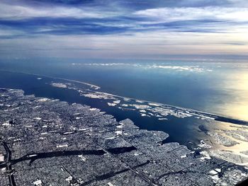 Scenic view of sea against sky during winter