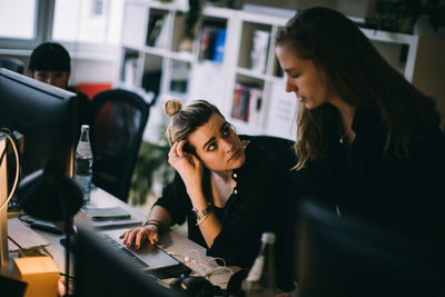 Businesswomen working at desk