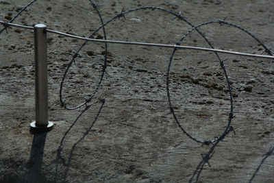 High angle view of metal fence