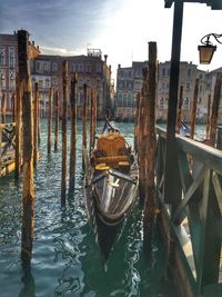 Boats moored at harbor