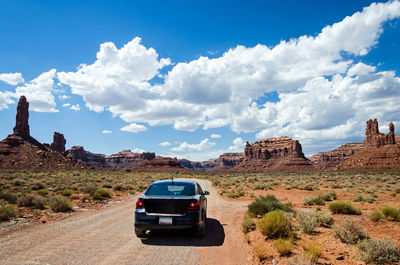 Car on land against sky