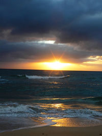 Scenic view of sea against sky during sunset