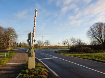 Empty road against sky