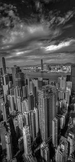 High angle view of modern buildings against sky in city