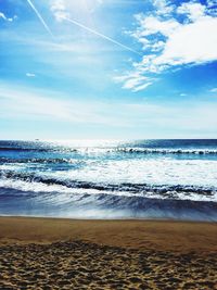 Scenic view of beach against sky