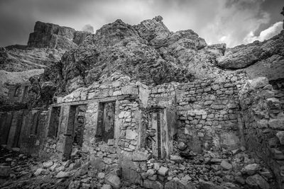 Low angle view of old ruins against sky