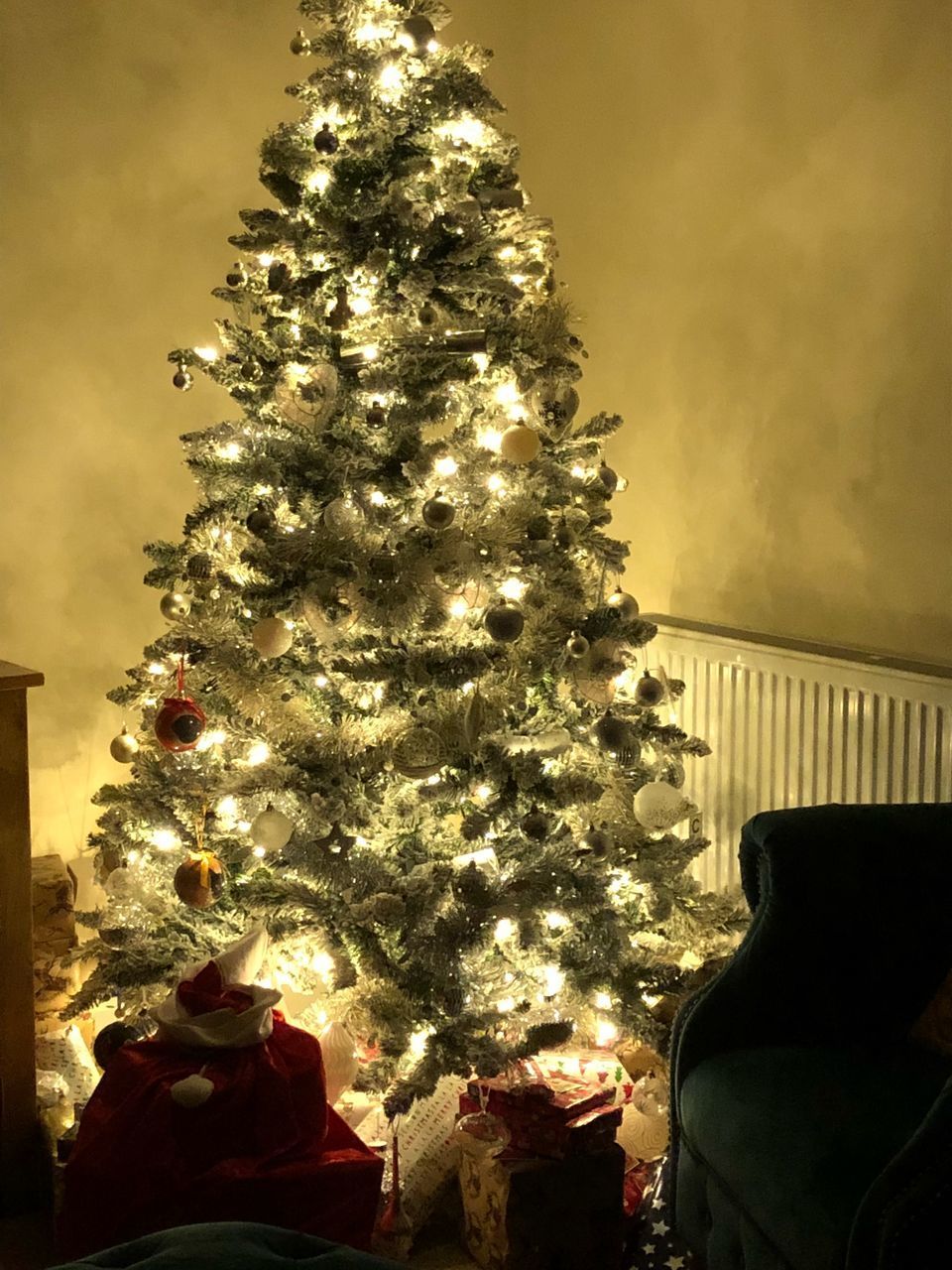 VIEW OF CHRISTMAS TREE AT HOME DURING SUNRISE