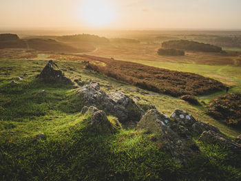 Aerial view of landscape against sky during sunset