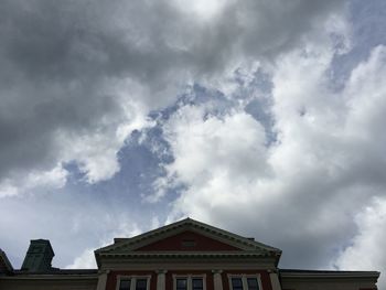 High section of building against cloudy sky