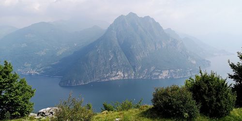 High angle view of trees and mountains against sky