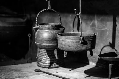 Close-up of antique containers in kitchen