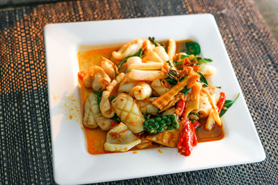 High angle view of pasta in plate on table