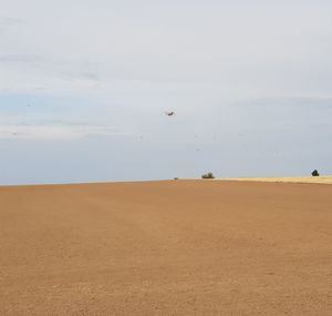 Scenic view of land against sky