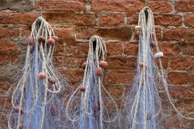 Close-up of rope tied on wall