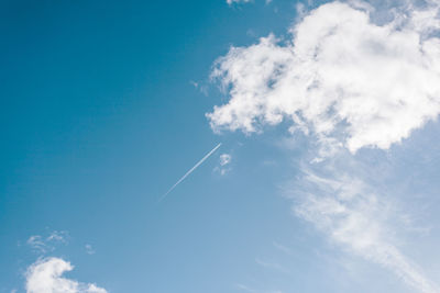 Low angle view of vapor trail in sky