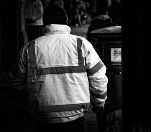 Rear view of men walking