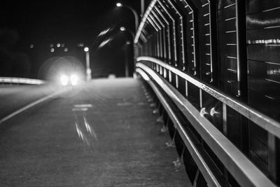 Empty seats in city at night