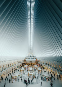 High angle view of people in illuminated building