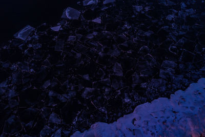 Close-up of rocks at night