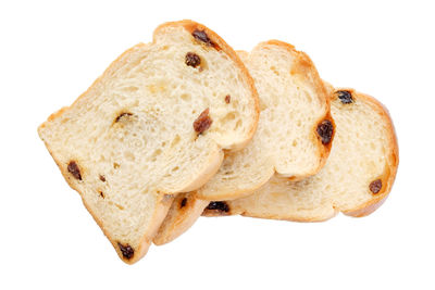 Close-up of bread against white background