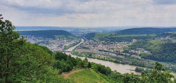 High angle view of river amidst landscape against sky