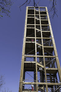 Low angle view of building against blue sky