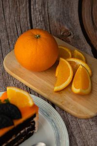 High angle view of orange slice in plate on table