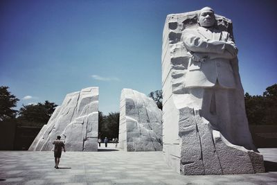 Low angle view of statue against sky