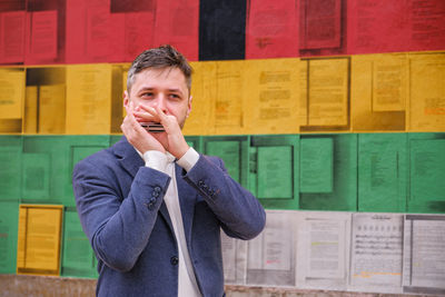 Side view of man using mobile phone