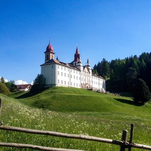 View of historical building against clear blue sky