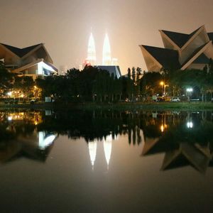 Reflection of illuminated buildings in water